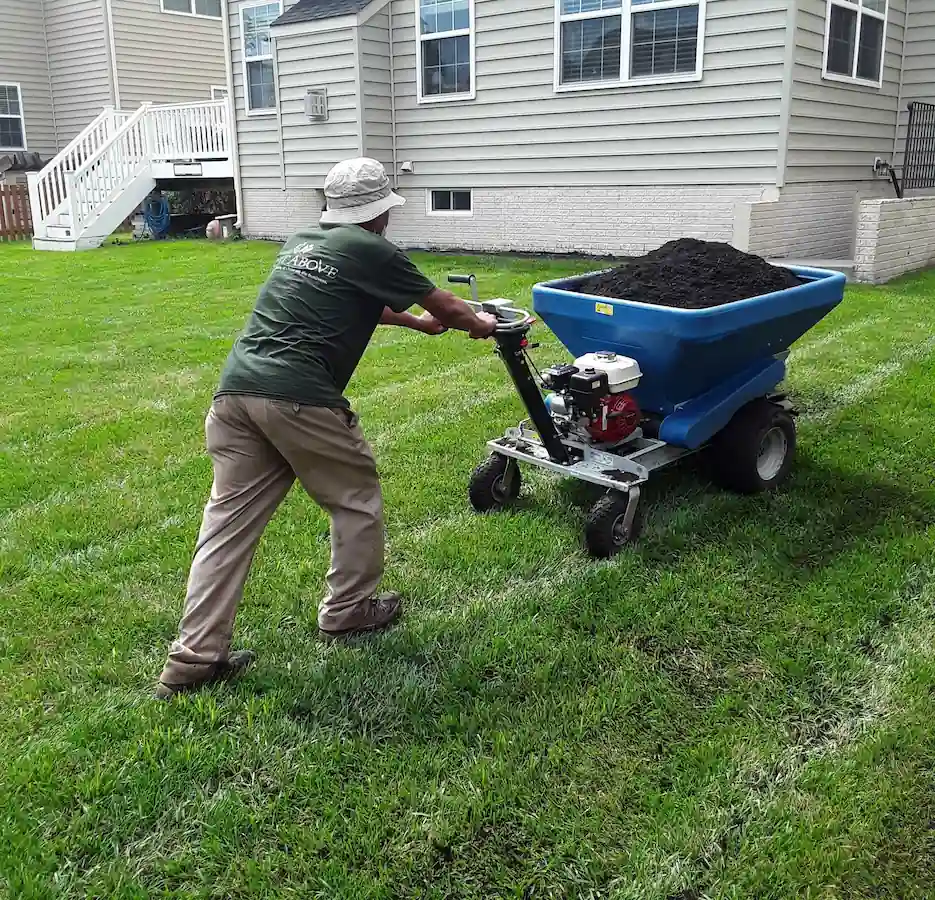 A Cut Above compost top-dressing crew at work
